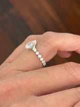 White gold pear shape and round lab diamond ring. Center stone is 1ct and approximately 9x5.3mm