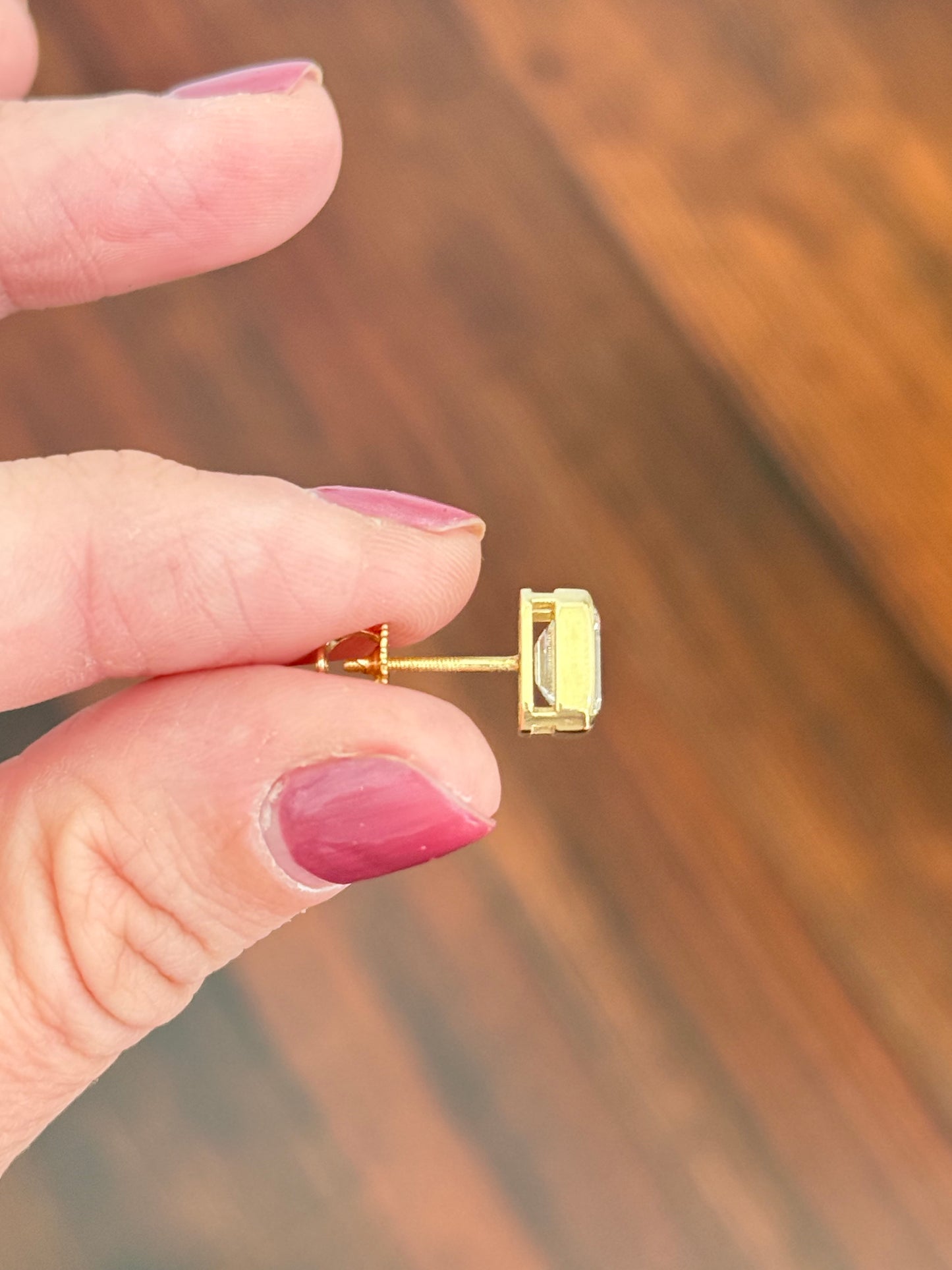 Yellow gold bezel set IGI certified 2+2ct emerald cut lab diamond stud earrings with screw backs