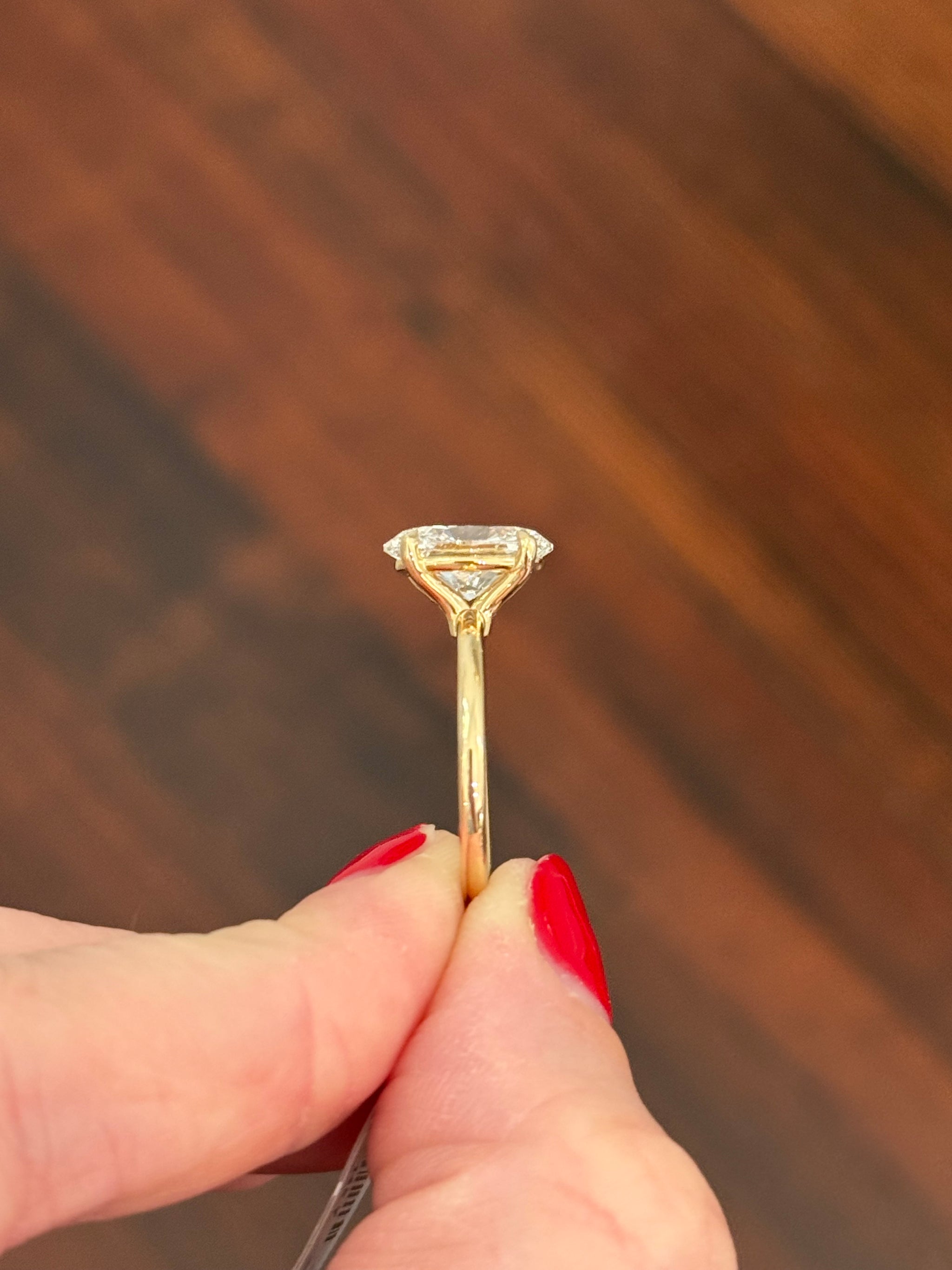 Yellow gold IGI certified oval lab diamond ring
