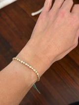 Yellow gold bezel set 3ct pear shape and round natural diamond bracelet