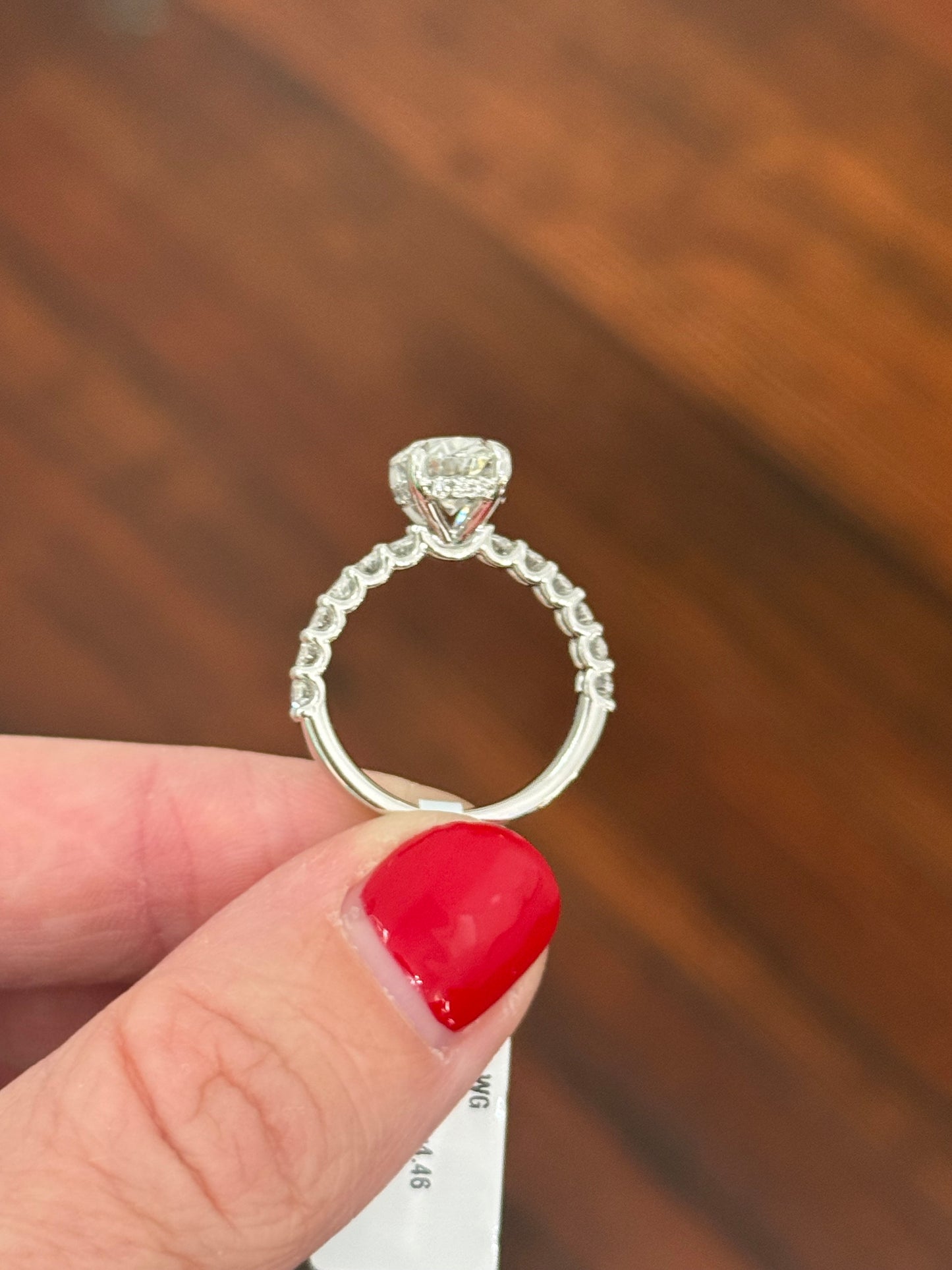 White gold oval lab diamond ring. Center stone is IGI certified and 3.07cts E VVS2