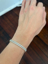 Yellow gold 5.56ct lab diamond bracelet. Prongs are white gold.