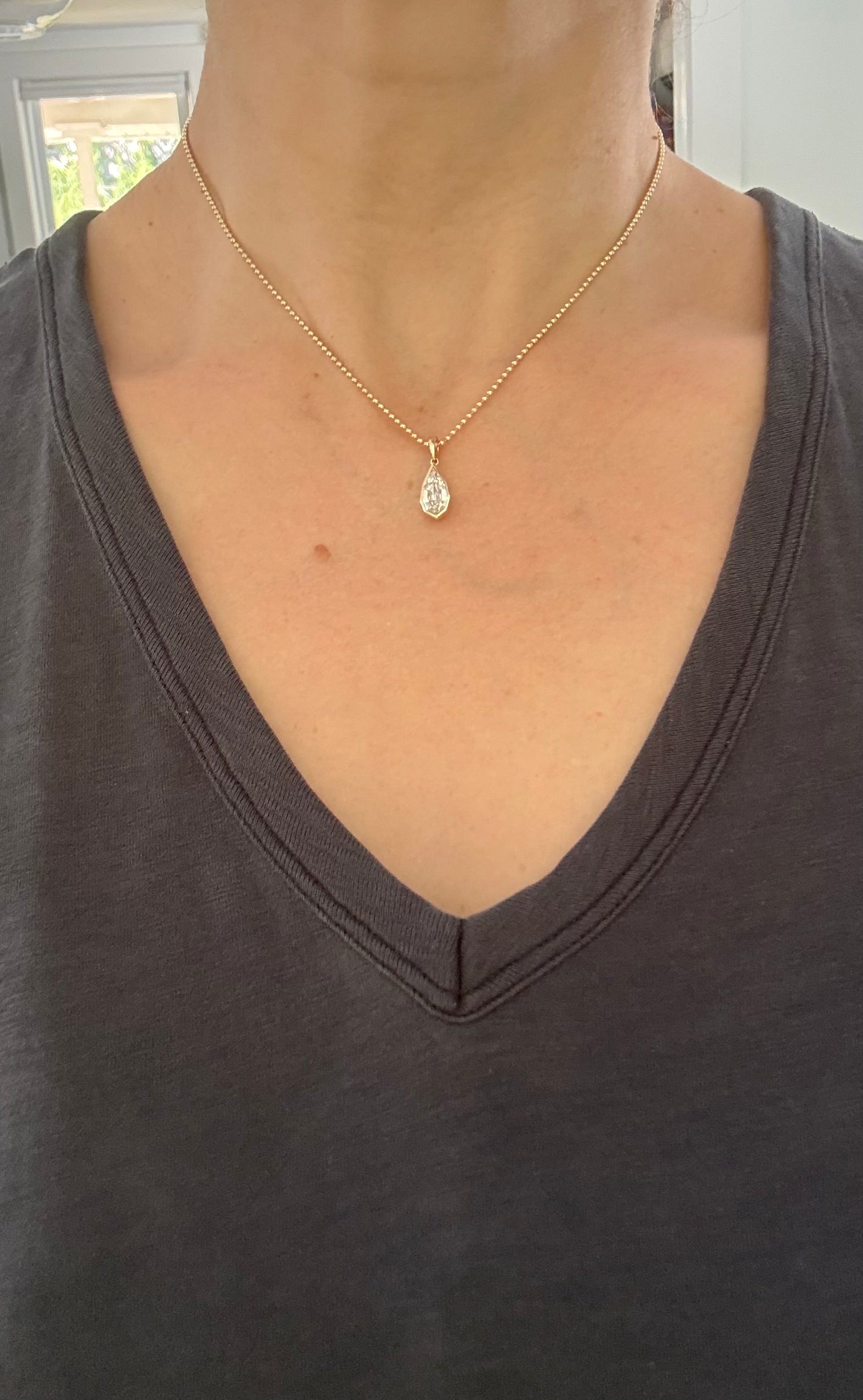 Yellow gold bezel set 1.78ct step cut pear lab diamond pendant