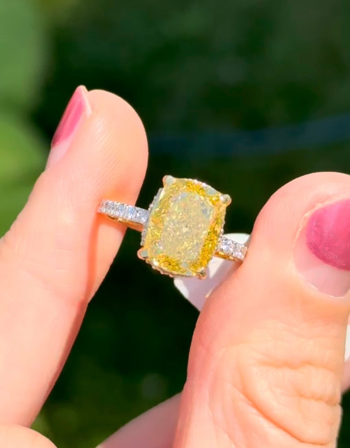 Yellow gold elongated cushion cut yellow lab diamond and white lab diamond ring