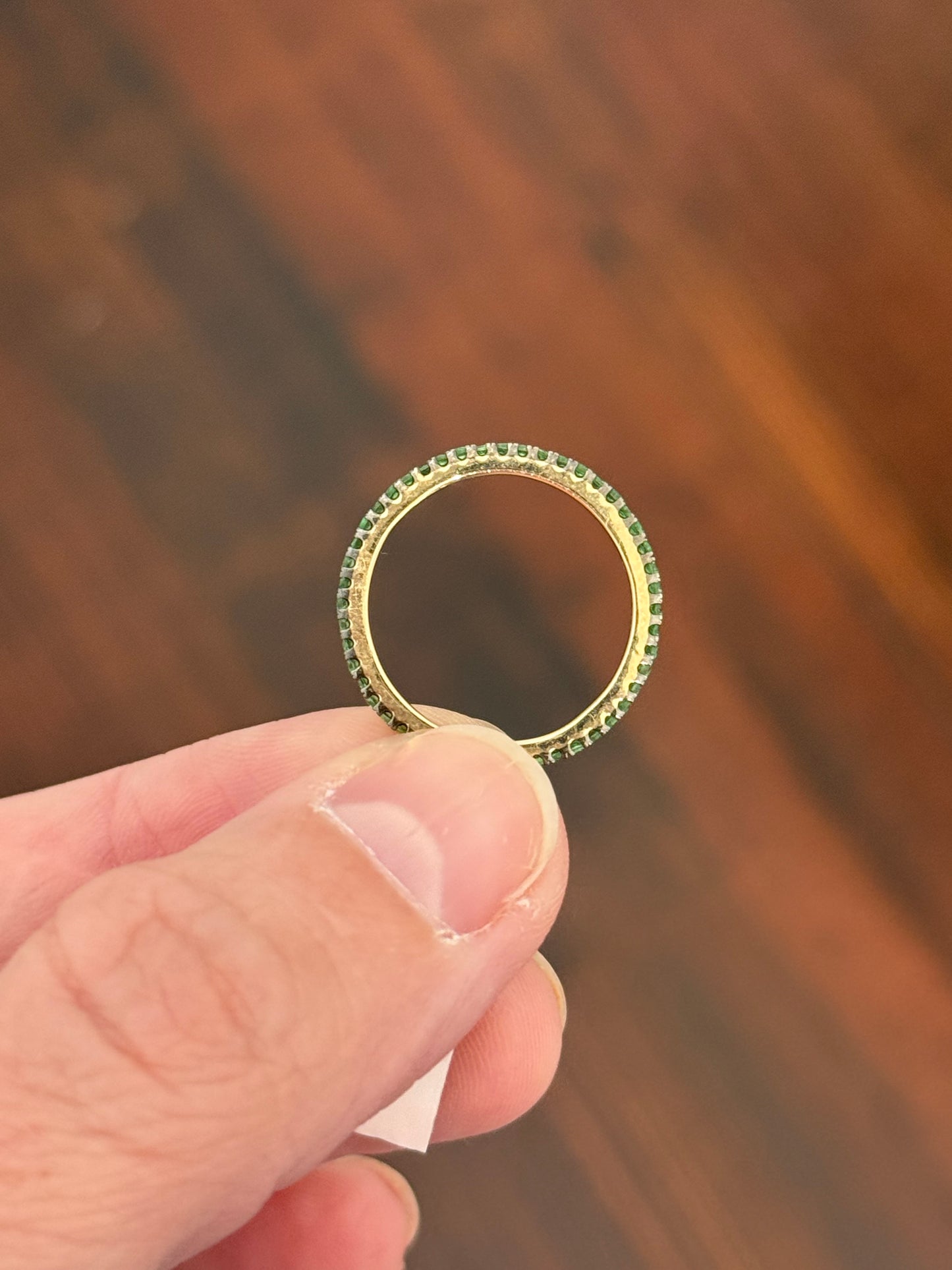 Yellow gold tsavorite eternity band