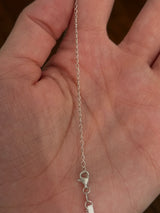 White gold emerald cut lab diamond necklace. Center stone is 0.50cts and measures 5.2x3.7mm. Chain is 16” with an adjustment of 4” to make as long as 20”.