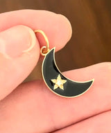 Yellow gold natural diamond and black enamel crescent pendant