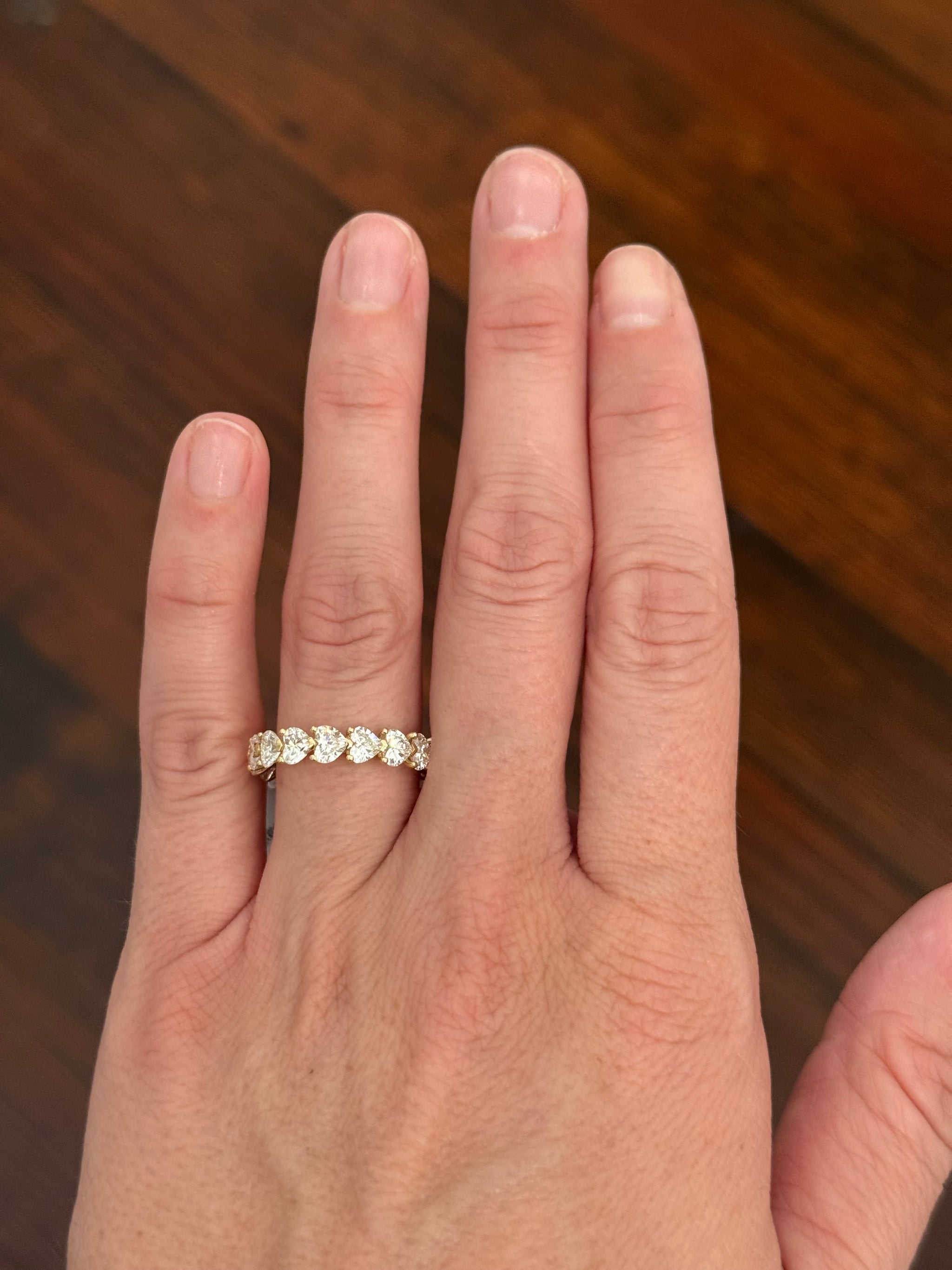 Yellow gold 4.49ct heart shaped lab diamond eternity band