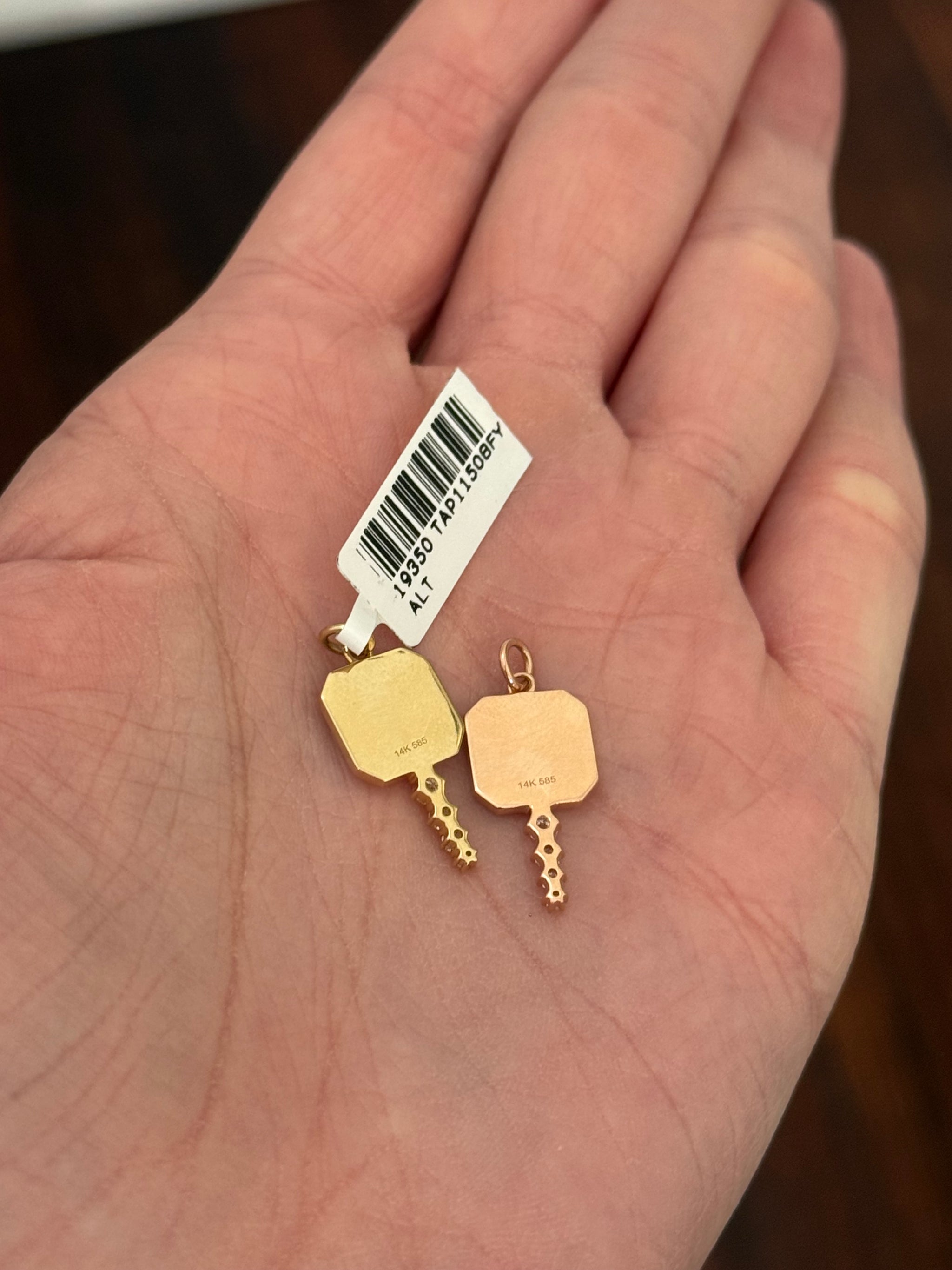 Natural diamond key pendants available in yellow or rose gold