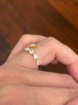 Yellow gold pear shape lab diamond bypass ring