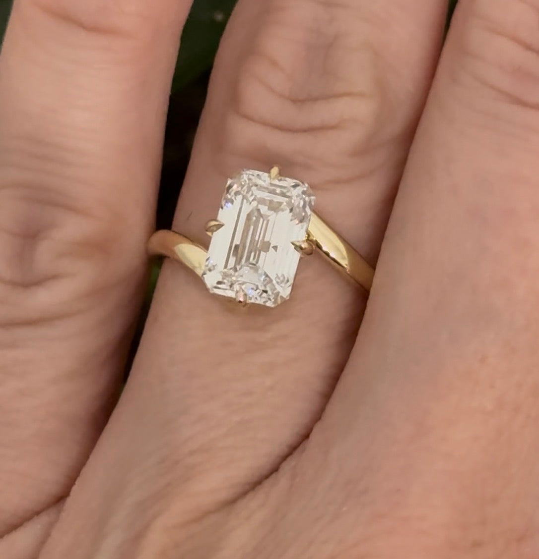 Yellow gold IGI certified 3.03ct emerald cut lab diamond ring