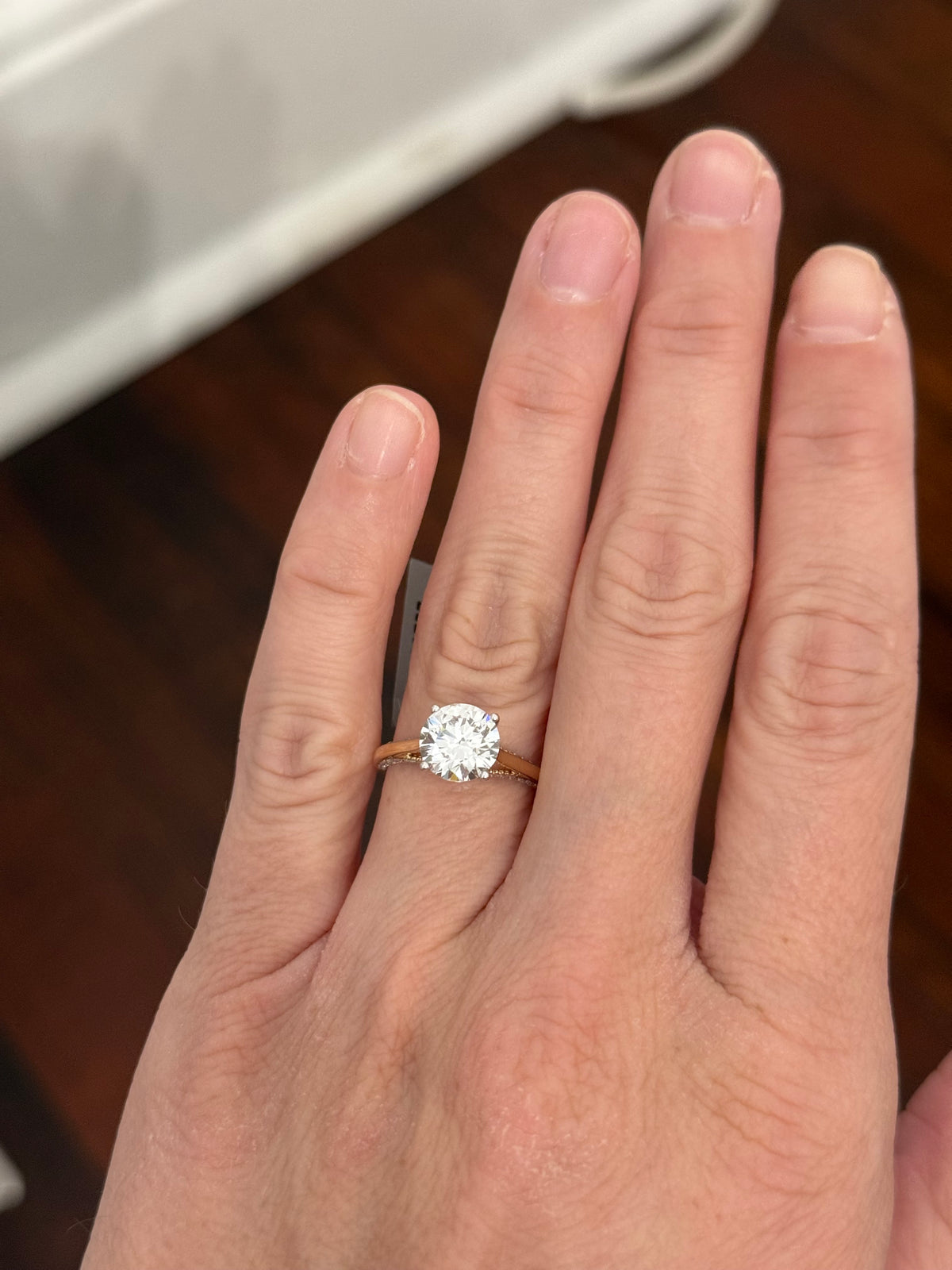 Yellow gold lab diamond ring. Lab diamonds are set in white gold.
