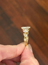 Yellow gold radiant and marquise lab diamond ring. Center stone is 3.07cts E VS1 and measures 9.8x6.7mm
