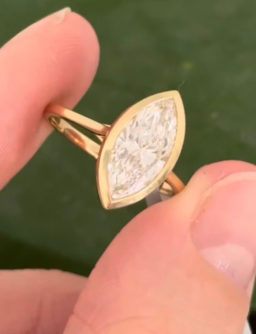 Yellow gold bezel set 1.99ct marquise lab diamond ring