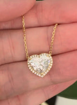 Yellow gold heart shaped lab diamond necklace. Center stone is 3.05cts and measures 8.7x9.6mm. Chain is 16” with 4” of adjustment to make as long as 20”.