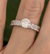 White gold 1.09ct round lab diamond and 4.1ct emerald cut eternity ring
