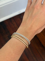 Wrap around lab diamond flex bracelets available in white and yellow gold