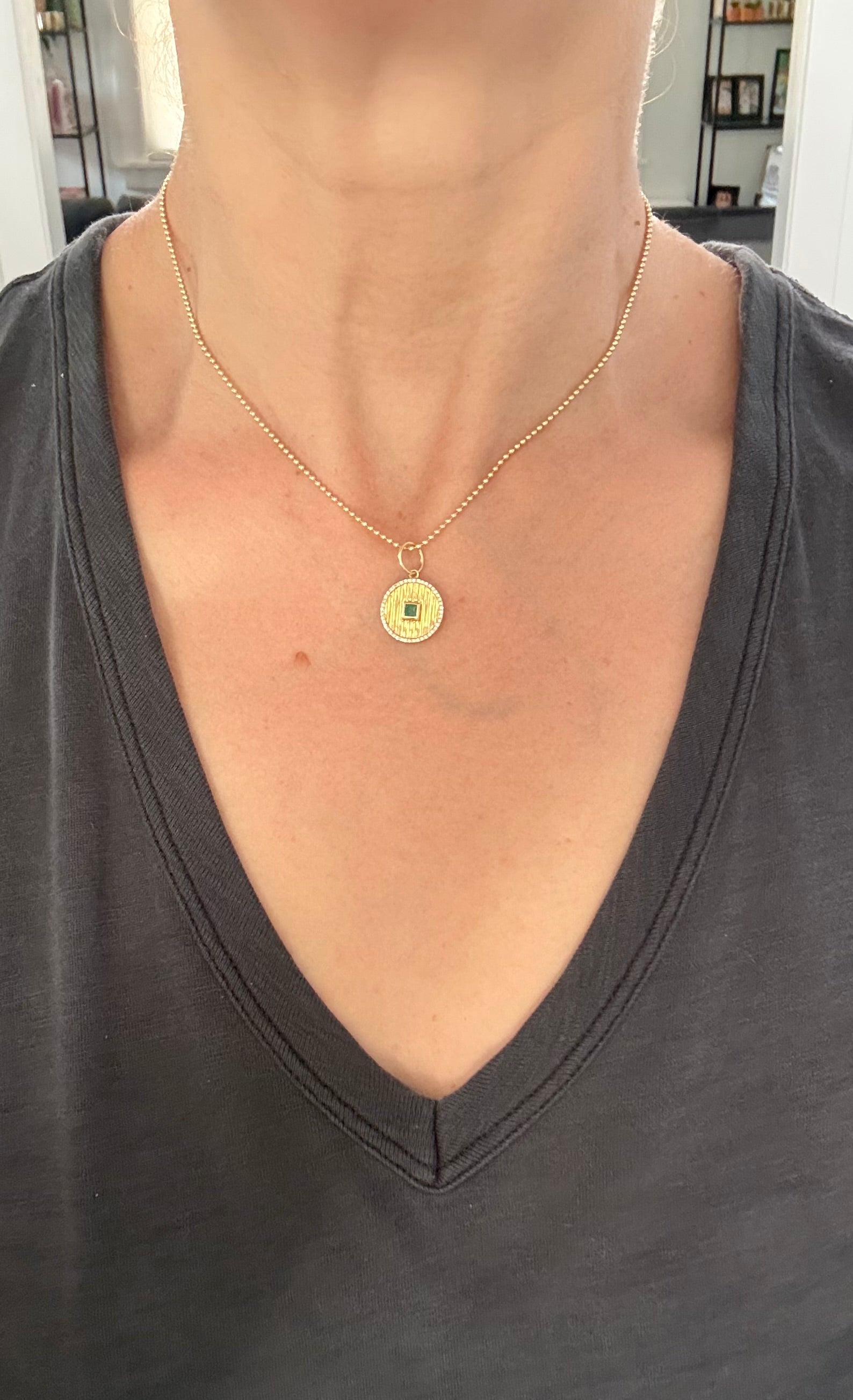 Yellow gold natural diamond pendants available with emerald or ruby