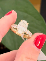 Yellow gold oval lab diamond ring. Center stone is IGI certified and 3.06cts E VVS2