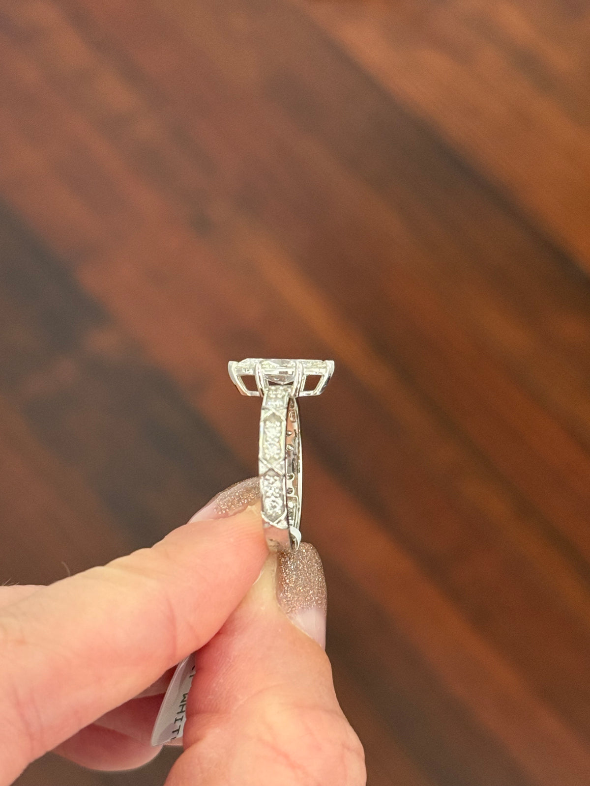 White gold marquise and round lab diamond ring. Center stone is 1ct and approximately 12x4.6mm
