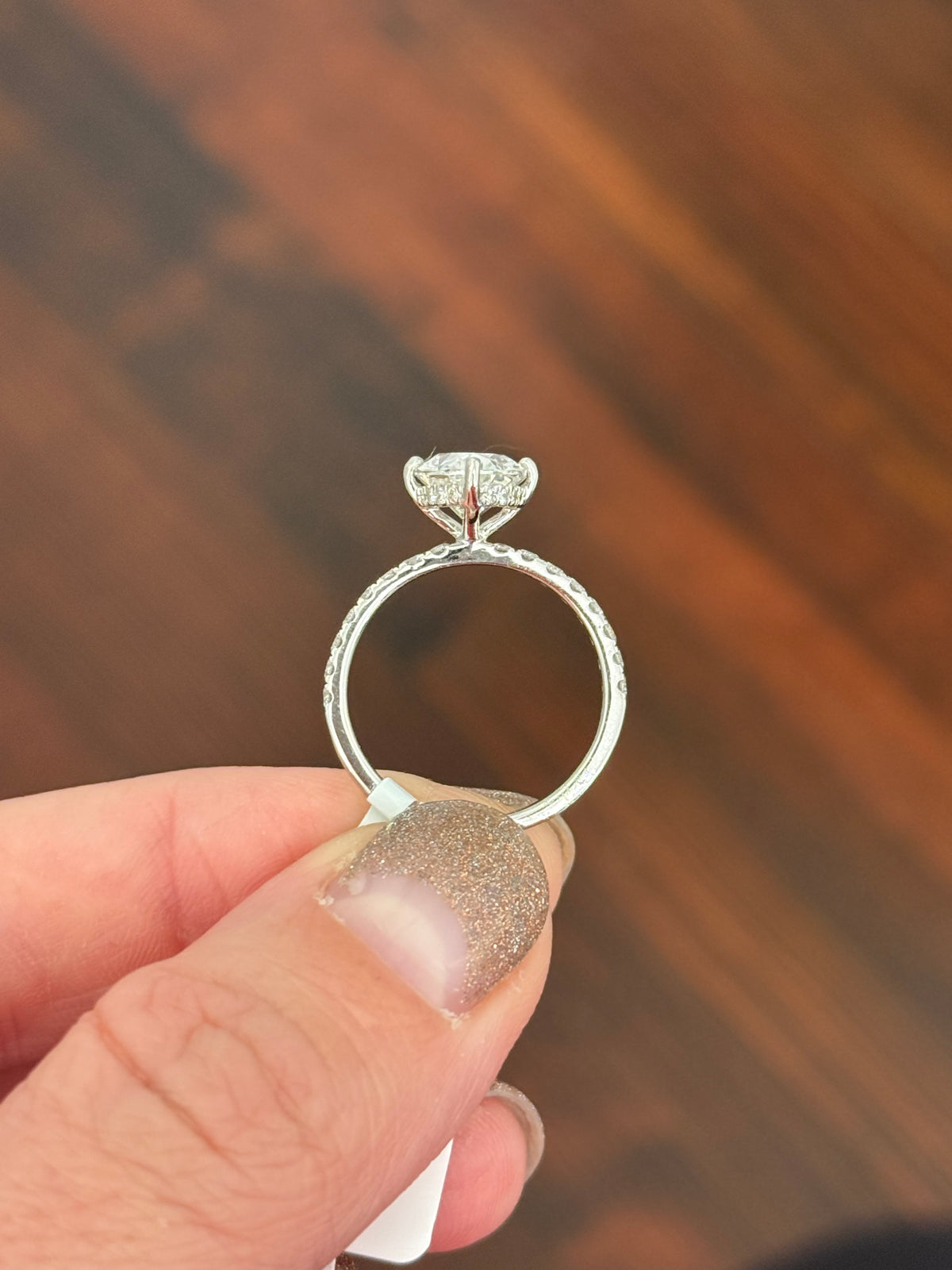 IGI certified white gold oval and round lab diamond ring