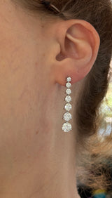 White gold 6.09ct graduated lab diamond earrings
