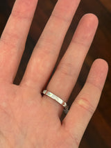 White gold oval and round lab diamond ring. Center stone is 1ct and approximately 8.5x5.5mm