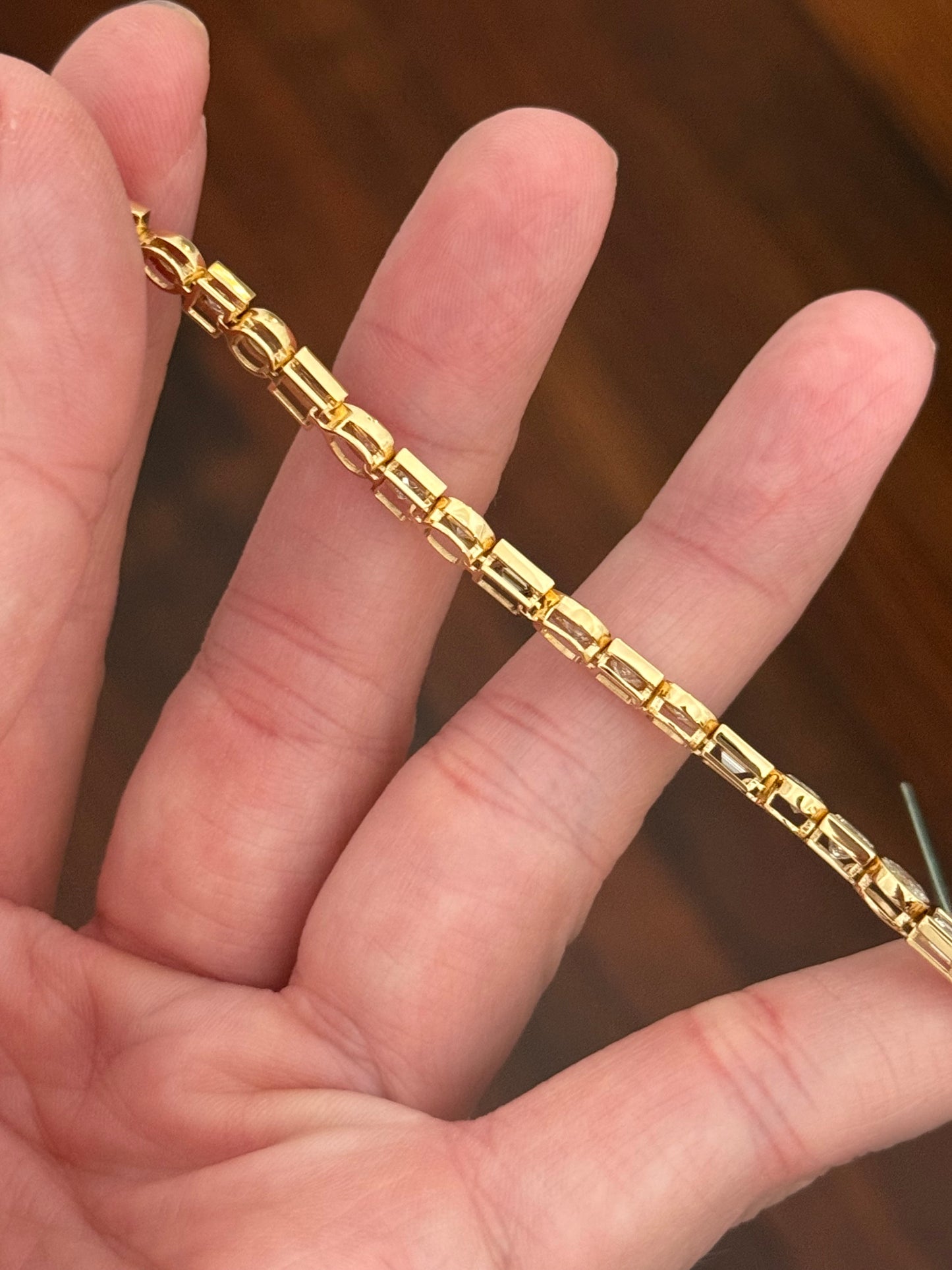 Yellow gold bezel set 6.68ct pear shape, oval, princess and emerald cut natural diamond bracelet