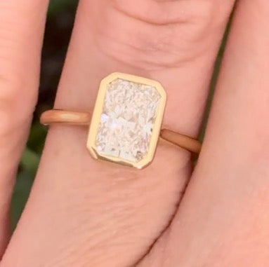Yellow gold bezel set 2.99ct radiant lab diamond ring