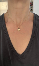 Yellow gold natural black diamond ladybug pendant