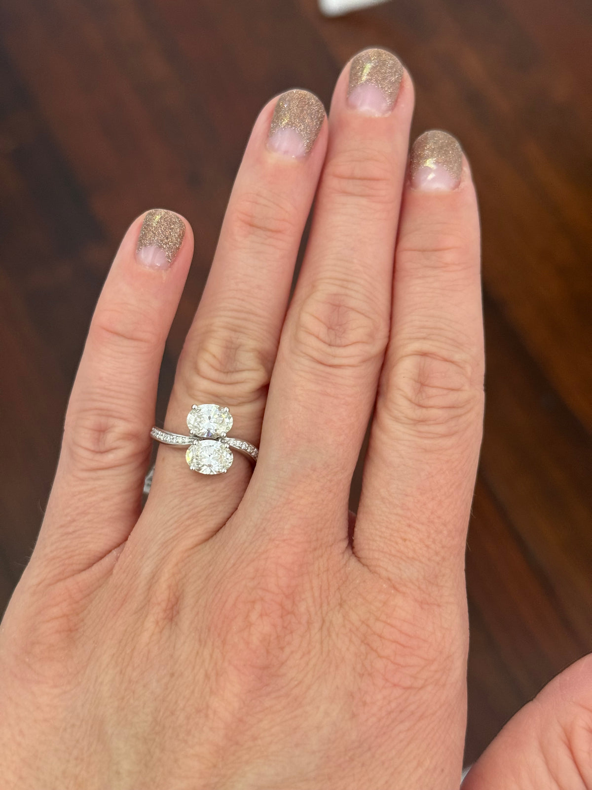 White gold oval and round lab diamond ring. Ovals are approximately 1ct each and 7.6x5mm