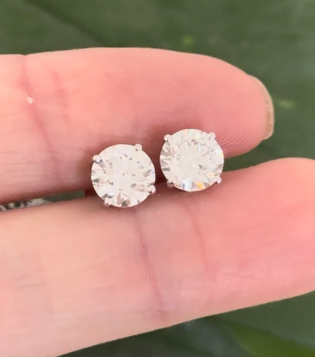 4 prong white gold basket setting TW 2.5ct lab diamond stud earrings with push backs. Includes IGI Jewelry Report.