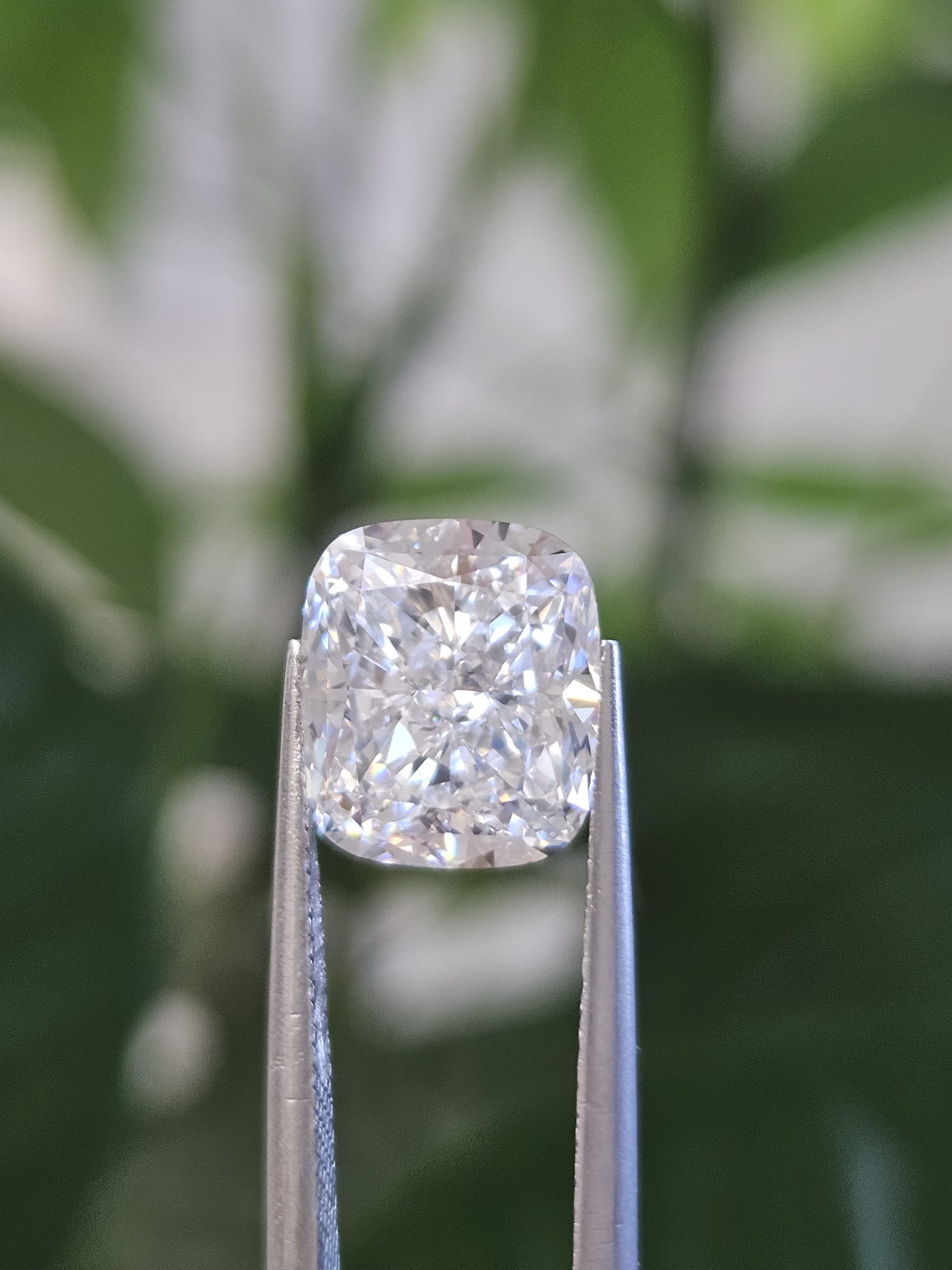 3.59CT CUSHION F VVS2 & 3.07CT OVAL FANCY VIVID YELLOW VVS2
