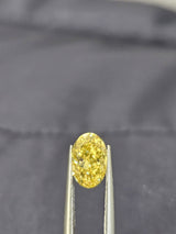 IGI 1.07CT OVAL FANCY VIVID YELLOW VVS2