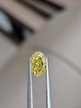 IGI 1.07CT OVAL FANCY VIVID YELLOW VVS2