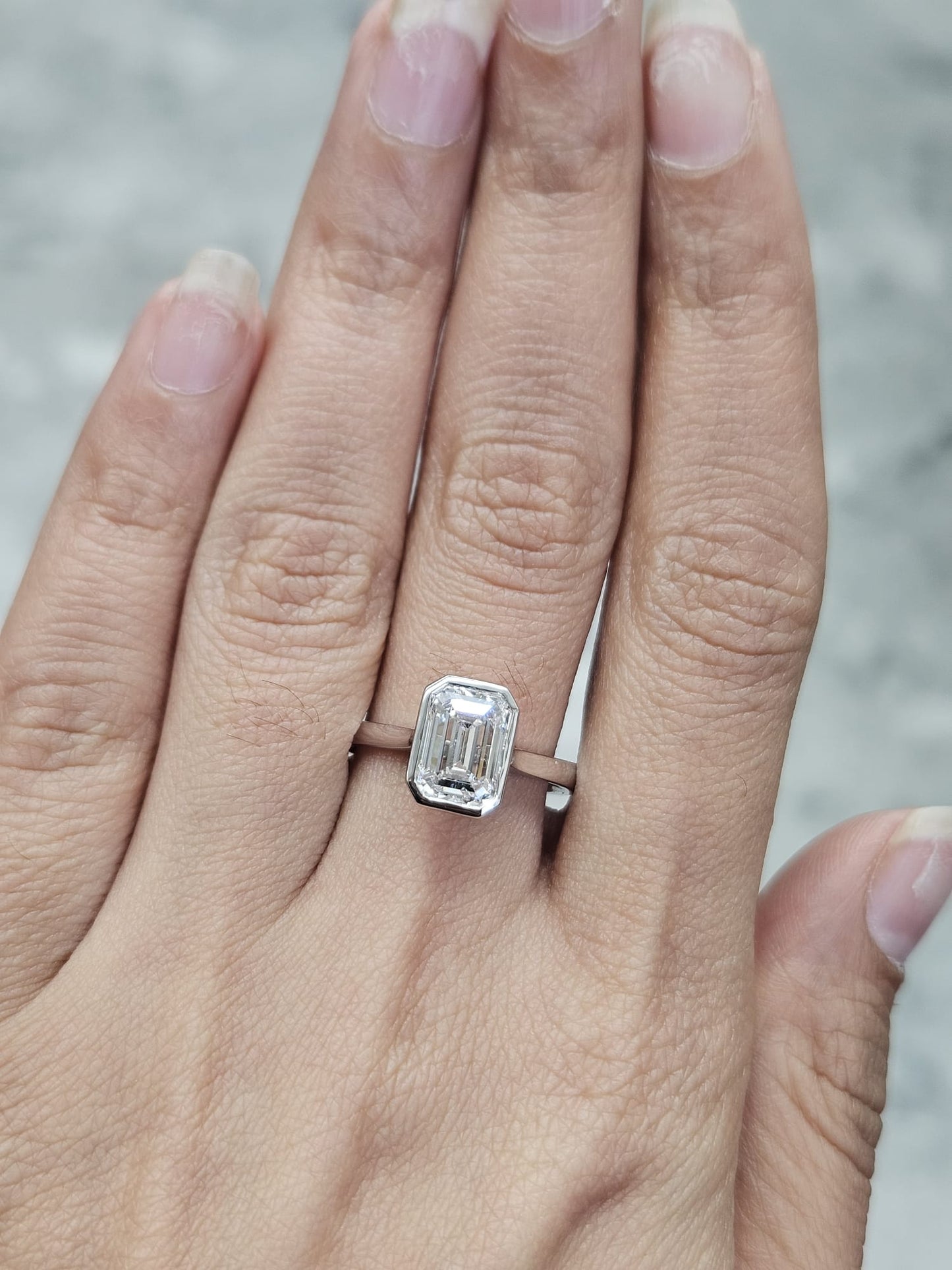 IGI White Gold Emerald Bezel Set Lab Diamond Ring