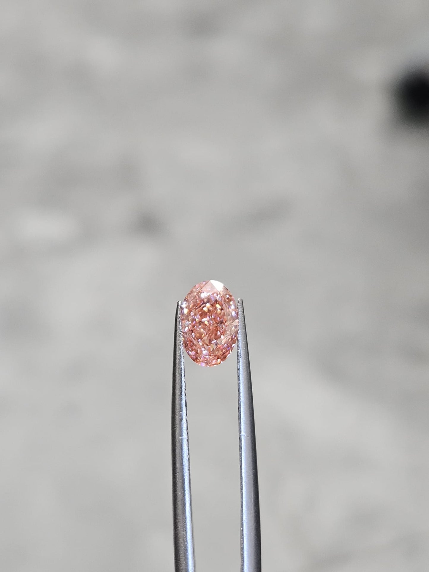 IGI 1.07CT OVAL FANCY VIVID PINK VVS2