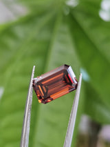 IGI 4.09CT EMERALD FANCY DEEP ORANGE VS1