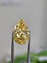 IGI 8.10CT PEAR FANCY VIVID YELLOW VS1