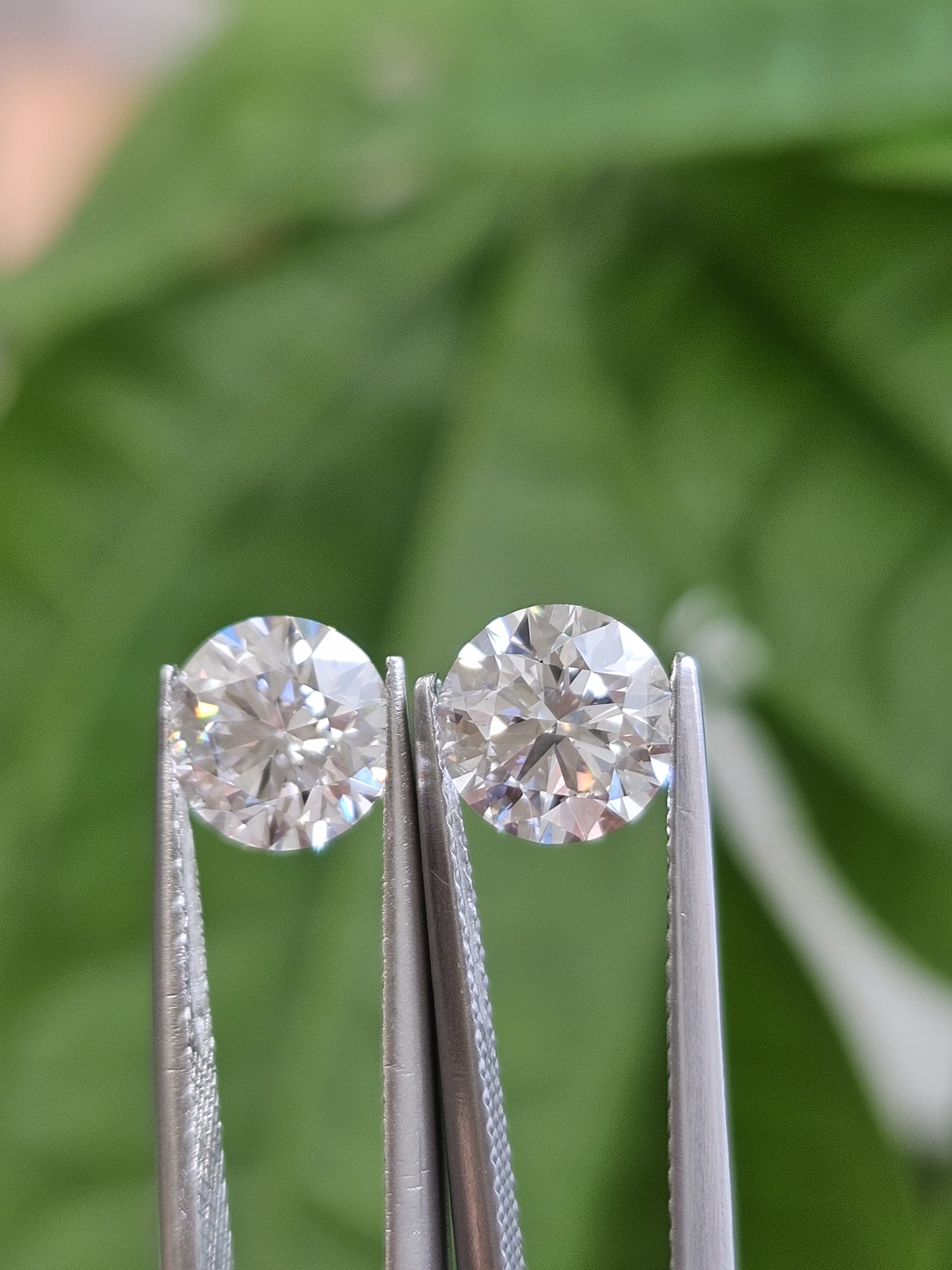 IGI 1.29CT + 1.30CT ROUND PAIR E VS1