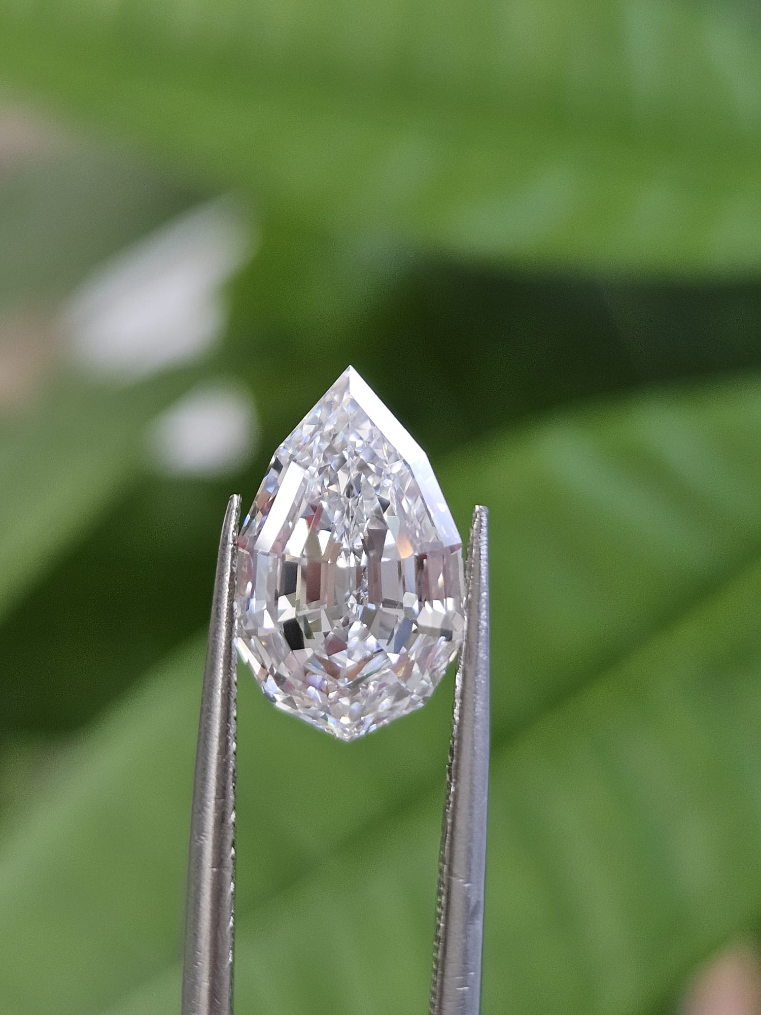 IGI 3.33CT PEAR STEP CUT D VVS2