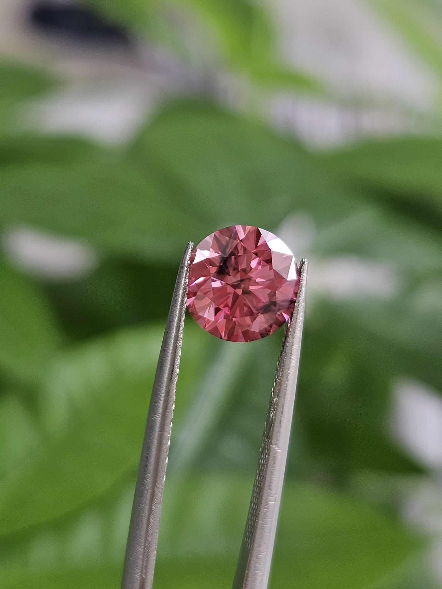 IGI 1.56CT ROUND FANCY VIVID PINK SI2