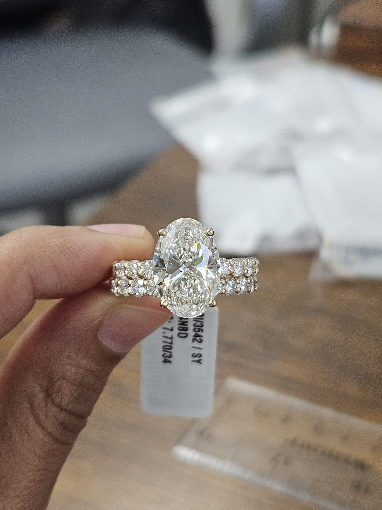7.77cttw Yellow Gold Oval Lab Diamond Ring with Eternity Band