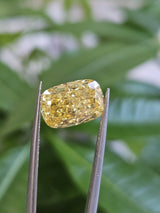 IGI 4.05CT CUSHION FANCY VIVID YELLOW VS1