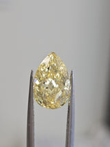 IGI 3.06CT PEAR FANCY VIVID YELLOW VS1