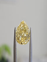 IGI 3.04CT PEAR FANCY VIVID YELLOW VS2