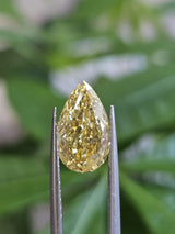 IGI 3.04CT PEAR FANCY VIVID YELLOW VS2