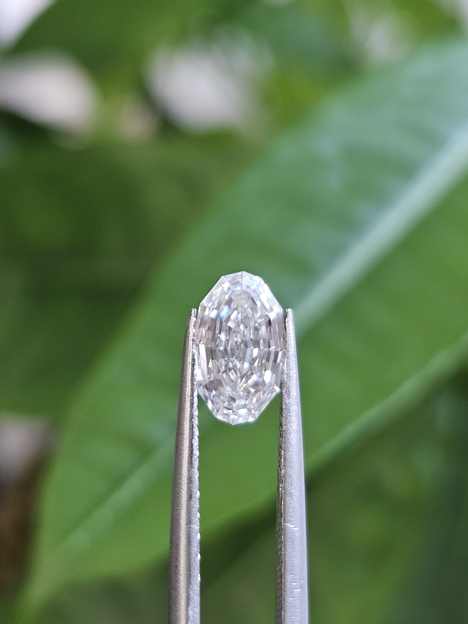 IGI 1.02CT OVAL STEP CUT E VS1