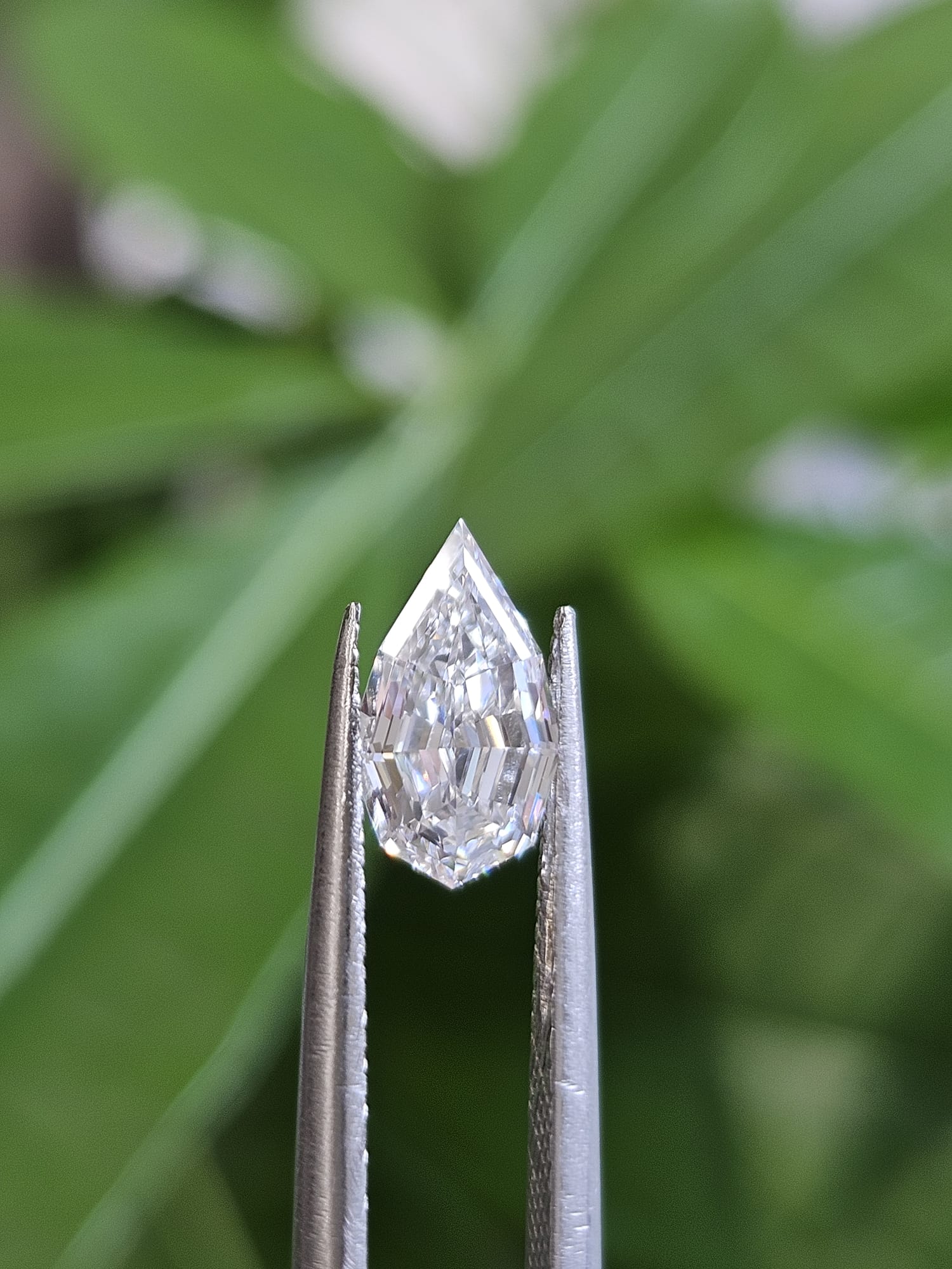 IGI 1.04CT PEAR STEP CUT E VVS2