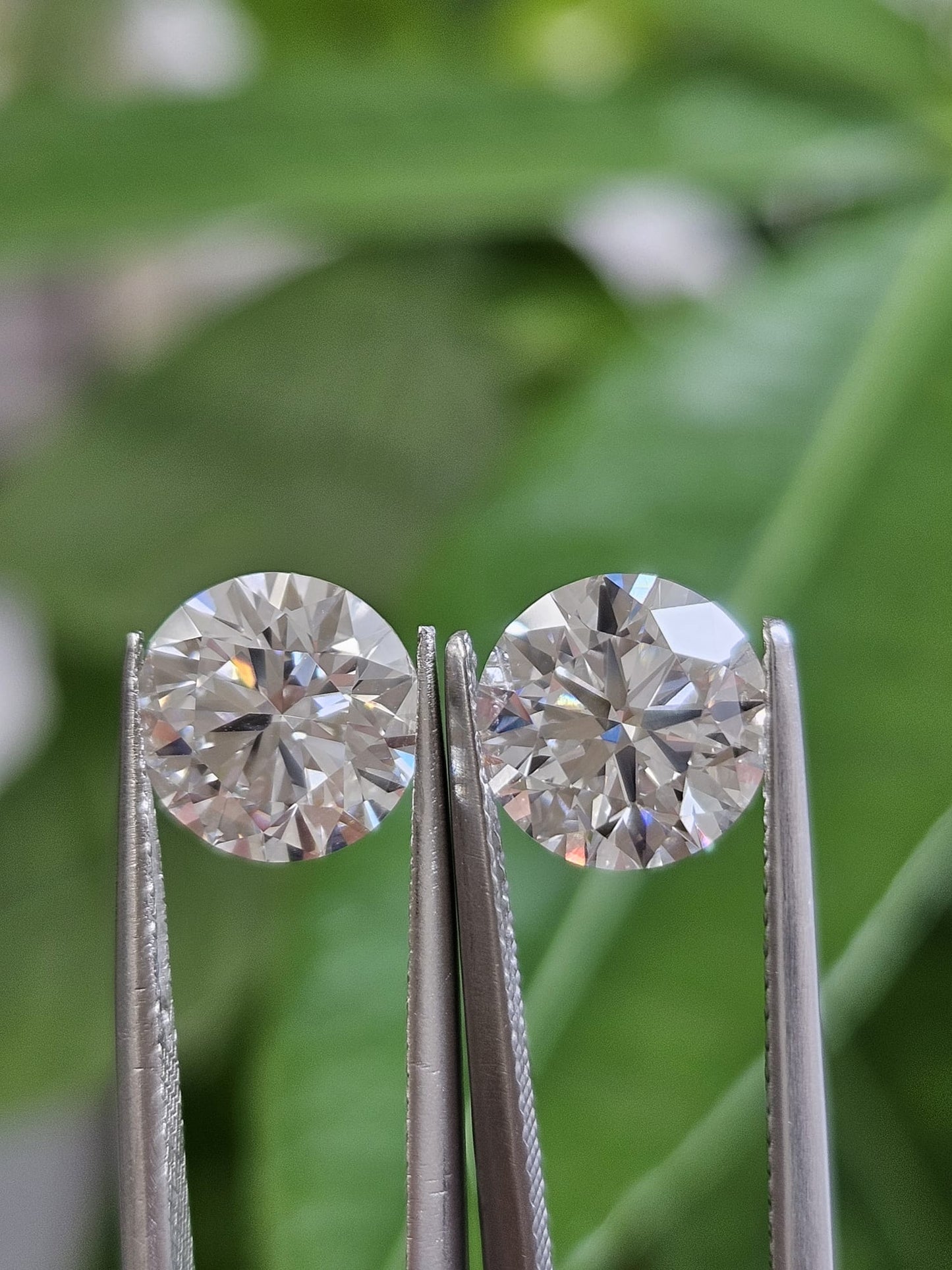 IGI 2CT + 2.05CT ROUND E VVS2 + E VVS1 PAIR